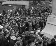 Crowds watching a Military Band in Trafalgar Square, 1940. Creator: British Pathe Ltd