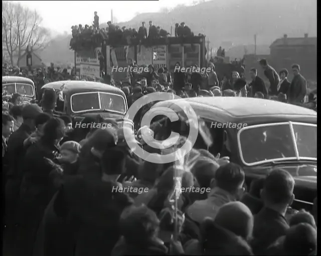 Crowds Watching a Parade of Cars, 1936. Creator: British Pathe Ltd.