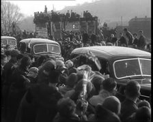 Crowds Watching a Parade of Cars, 1936. Creator: British Pathe Ltd