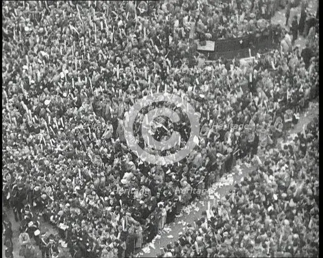 Crowds Watching the Coronation Procession of George VI, His Majesty the King, 1937. Creator: British Pathe Ltd.