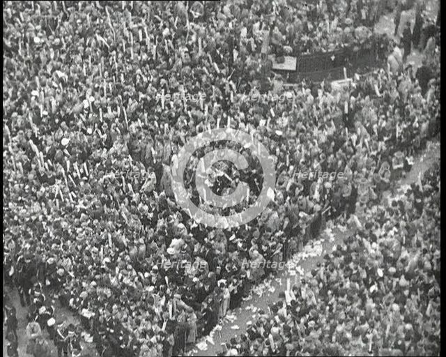 Crowds Watching the Coronation Procession of George VI, His Majesty the King, 1937. Creator: British Pathe Ltd.