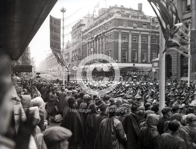 Crowds watching the coronation procession of Queen Elizabeth II, Oxford Street, London, 2 June 1953. Creator: Arthur Charles Kirby Ware.