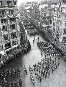 Crowds watching the coronation procession of Queen Elizabeth II, Oxford Circus, London, 2 June 1953. Creator: Arthur Charles Kirby Ware