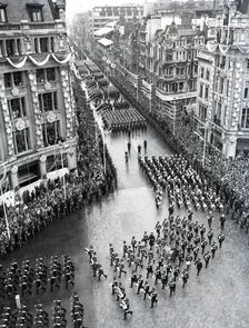 Crowds watching the coronation procession of Queen Elizabeth II, Oxford Circus, London, 2 June 1953. Creator: Arthur Charles Kirby Ware