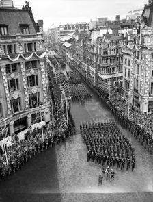 Crowds watching the coronation procession of Queen Elizabeth II, Oxford Circus, London, 2 June 1953. Creator: Arthur Charles Kirby Ware