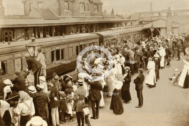 Crowds waving off troops leaving to fight in the First World, War, Britain, 1914, (1935). Creator: Unknown.