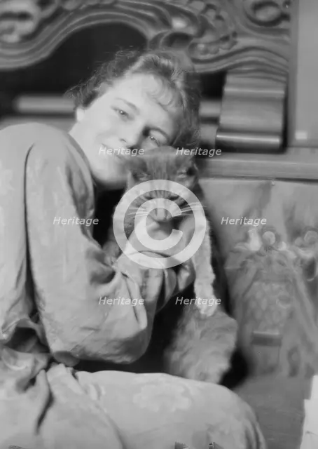 Cutler, Miss, with Buzzer the cat, portrait photograph, 1915 May 26. Creator: Arnold Genthe.