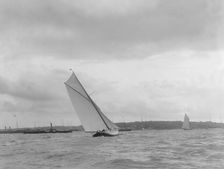 Cutter heeling hard on upwind leg. Creator: Kirk & Sons of Cowes
