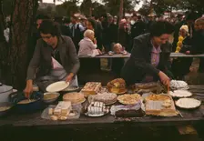 Cutting the pies and cakes at the barbeque dinner, Pie Town, New Mexico Fair, 1940. Creator: Russell Lee