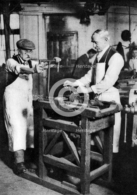 Cutting a key barrel, London, 1926-1927. Artist: Unknown
