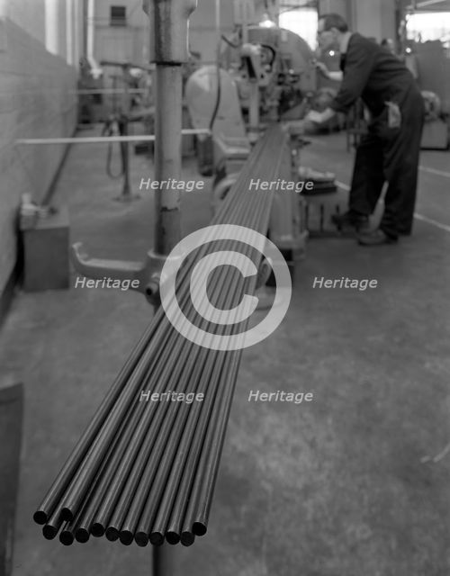 Cutting steel rods to length, Park Gate Iron & Steel Co, Rotherham, South Yorkshire, 1964. Artist: Michael Walters