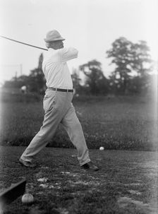 Cummins, Albert Baird, Governor of Iowa, 1902-1908; Senator, 1908-1926. Playing Golf, 1917. Creator: Harris & Ewing