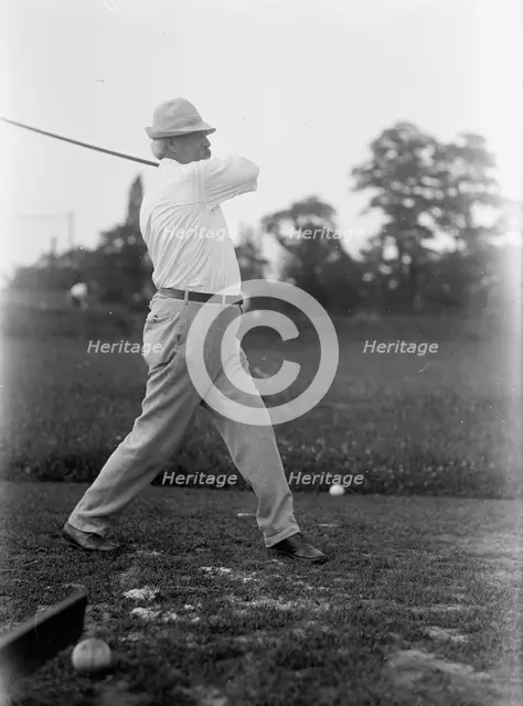 Cummins, Albert Baird, Governor of Iowa, 1902-1908; Senator, 1908-1926. Playing Golf, 1917. Creator: Harris & Ewing.