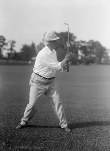 Cummins, Albert Baird, Governor of Iowa, 1902-1908; Senator, 1908-1926. Playing Golf, 1917. Creator: Harris & Ewing