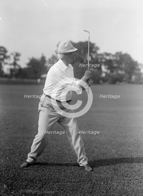 Cummins, Albert Baird, Governor of Iowa, 1902-1908; Senator, 1908-1926. Playing Golf, 1917. Creator: Harris & Ewing.