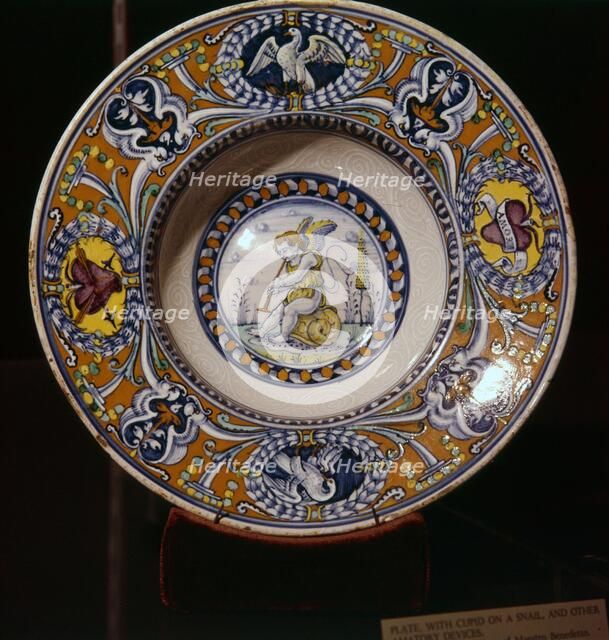 Cupid on a Snail blowing a trumpet, plate from Siena, Italy, 1510. Artist: Unknown.