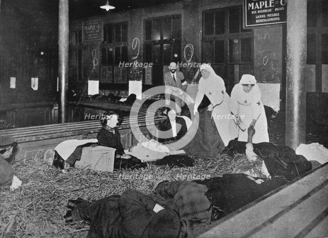 'Customs Room at the Gare du Nord, Paris, a relief station for French refugees', 1914. Artist: Unknown.