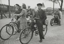 Cyclists by a level crossing, Landskrona, Sweden, 1950