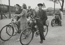 Cyclists by a level crossing, Landskrona, Sweden, 1950. Creator: Unknown