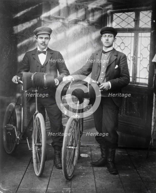 Cyclists in the studio; two men with bicycles, 1890-1910. Creator: Lars Olsson Akerman.