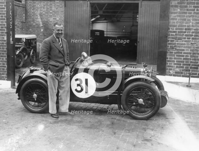 Cyril Paul with his MG C type, 1932. Artist: Unknown
