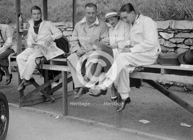 Cyril Paul (centre) and other drivers at the RAC TT Race, Ards Circuit, Belfast, 1932. Artist: Bill Brunell.