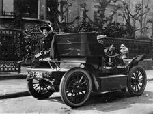 A 1904 De Dion car parked in a street, (c1904?)