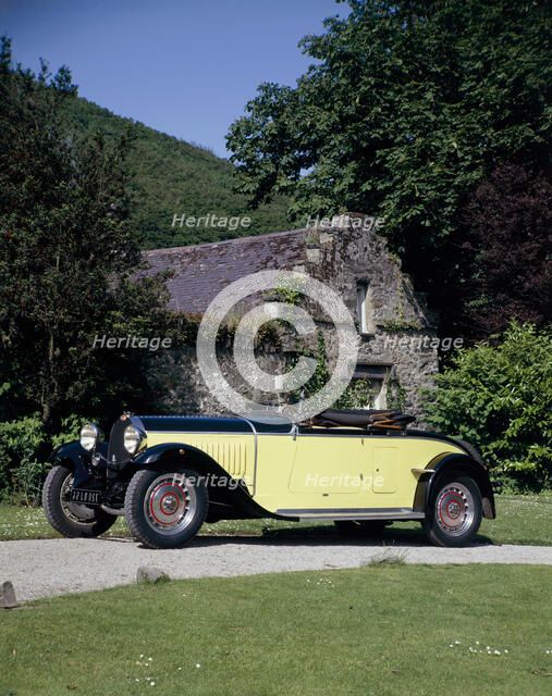 A 1934 Bugatti Type 46 outside a cottage. Artist: Unknown