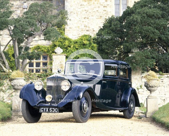 A 1935 Rolls-Royce 20/25. Artist: Unknown