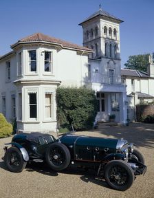 A 1930 Bentley Supercharged outside a house
