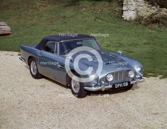 A 1964 Aston Martin DB5 sportscar. Artist: Unknown