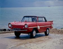 A 1965 Amphicar at the water's edge