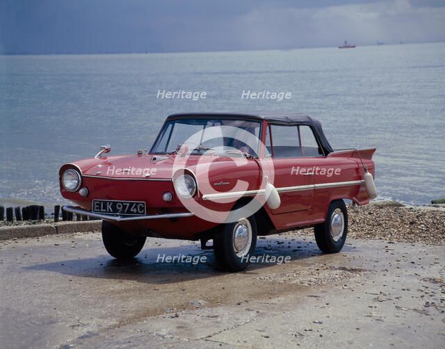A 1965 Amphicar at the water's edge. Artist: Unknown
