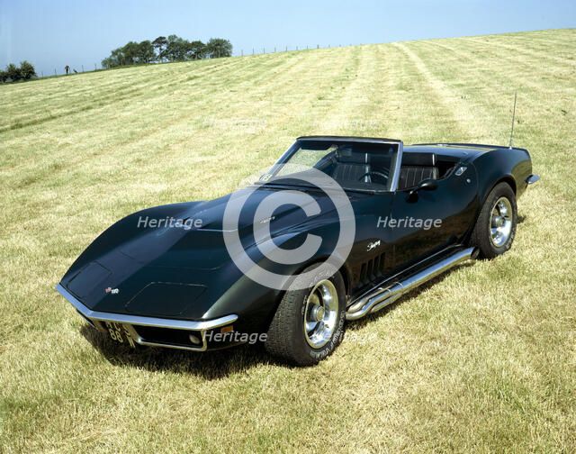 A 1969 Chevrolet Corvette Stingray in a field. Artist: Unknown
