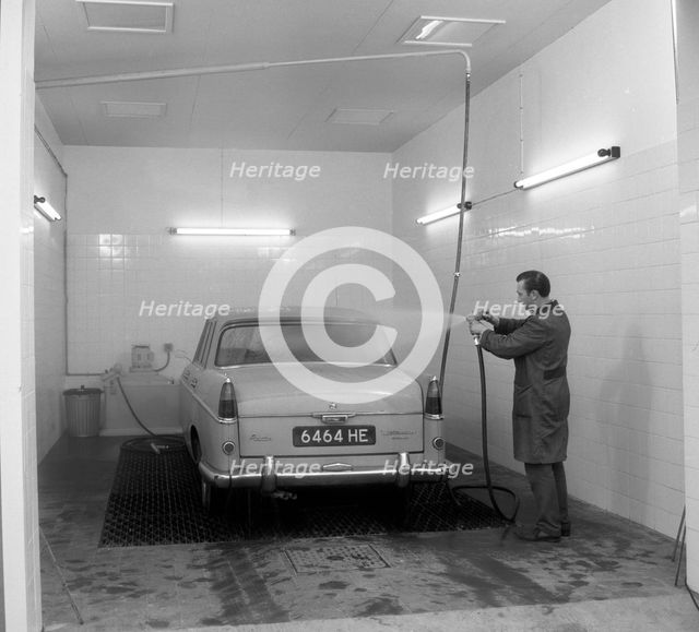 A 1961 Austin Westminster in a car wash, Grimsby, 1965.  Creator: Michael Walters.