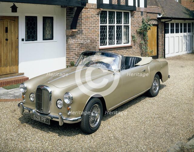 A 1963 Alvis car parked on a gravel driveway. Artist: Unknown