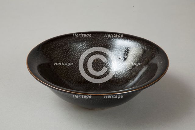 A 20th century copy of buff-bodied Cizhou-type bowl with oil spot glaze, 20th century. Artist: Unknown.
