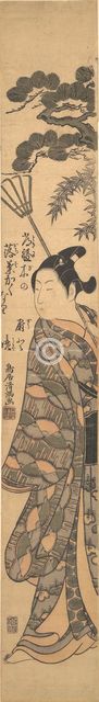 A Tall Young Man Carrying a Bamboo Rake Over His Left Shoulder, ca. 1763., ca. 1763. Creator: Torii Kiyomitsu.