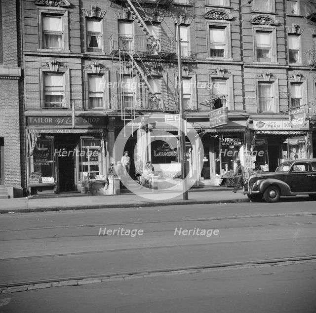 A tenament house in Harlem, New York, 1943. Creator: Gordon Parks.
