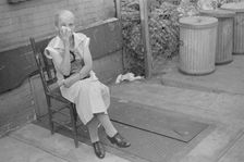 A tenant, 61st Street between 1st and 3rd Avenues, New York, 1938. Creator: Walker Evans