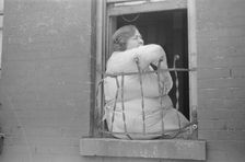 A tenant, 61st Street between 1st and 3rd Avenues, New York, 1938. Creator: Walker Evans