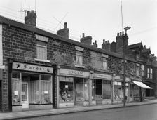 A terrace of late Vistorian shops in Bank Street, Mexborough, South Yorkshire, 1963. Creator: Michael Walters