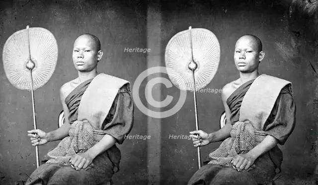 A Thai monk holding a fan, 1865. Creator: John Thomson.