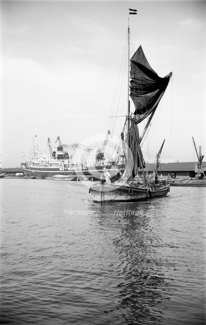 A Thames sailing barge in the Royal Albert Dock, Canning Town, London, c1945-c1965. Artist: SW Rawlings