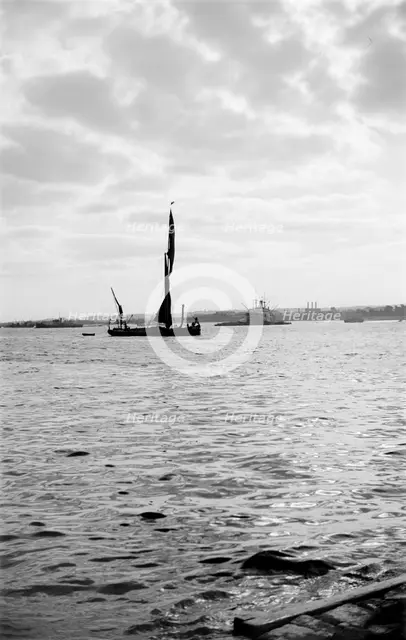 A Thames sailing barge in Gravesend Reach, Kent, c1945-c1965.  Artist: SW Rawlings
