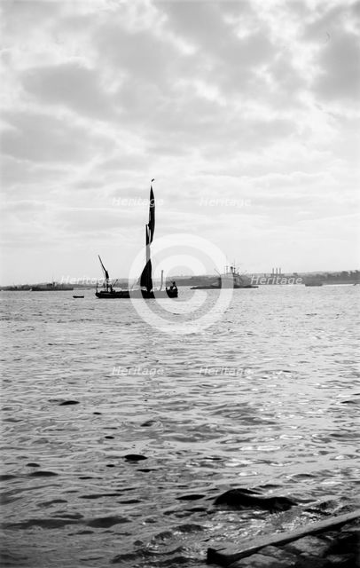 A Thames sailing barge in Gravesend Reach, Kent, c1945-c1965.  Artist: SW Rawlings