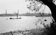 A Thames sailing barge on the River Thames at Tilbury, Essex, c1945-c1965. Artist: SW Rawlings