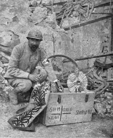 A travers le champ de bataille; apres notre reoccupation de Breny (Aisne), un pretre..., 1918. Creator: Unknown