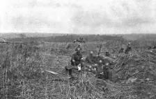 A travers le champ de bataille; en seconde ligne dans les bles; finie la guerre de..., 1918. Creator: Unknown