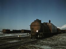 A train (or "cut") being pushed out of a receiving..., Proviso yard, C & NW RR., Chicago, Ill., 1942 Creator: Jack Delano